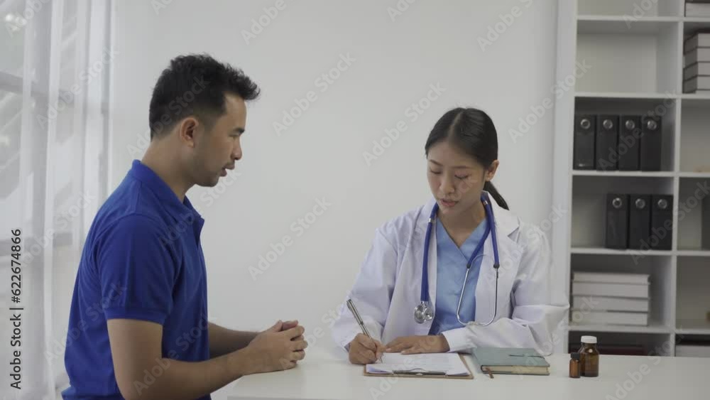 Beautiful young asian female doctor giving advice to male patient in hospital office. Healthcare concept, Female doctor give advice and writing prescription to patient in clinic. Beautiful young asian female doctor giving advice to male patient in hospital office. Healthcare concept, Female doctor give advice and writing prescription to patient in clinic.