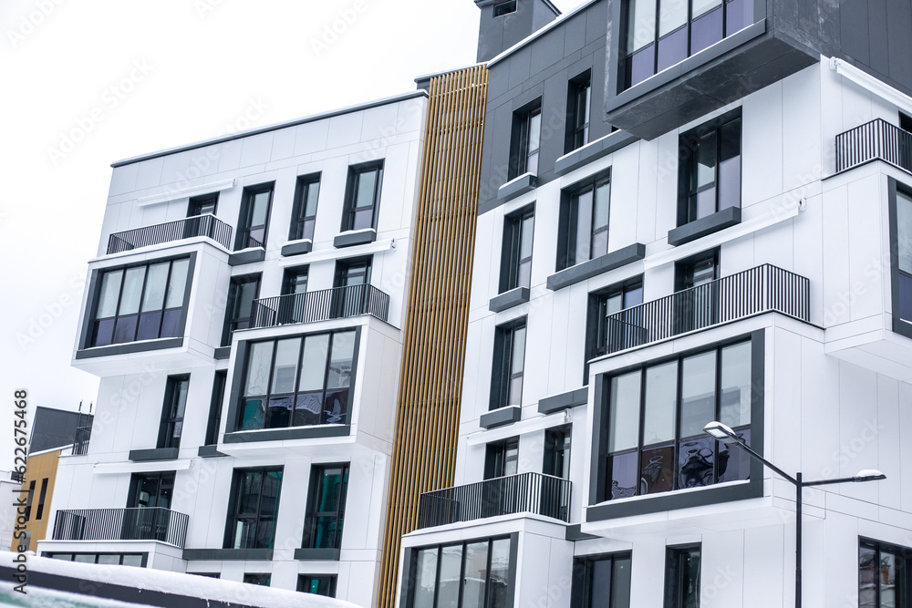 Modern apartment buildings exteriors in winter day