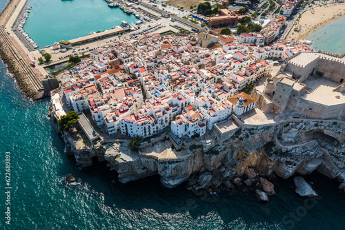 Aerial view of Peniscola, a small town on the rock along the Mediterranean coastline in Castellon, Spain. photo