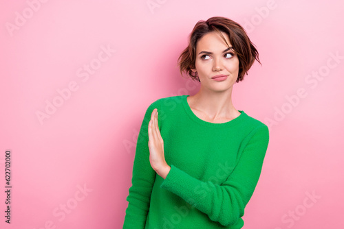 Photo of young funny woman showing stop sign dislike against propaganda stop share fake news look novelty isolated on pink color background