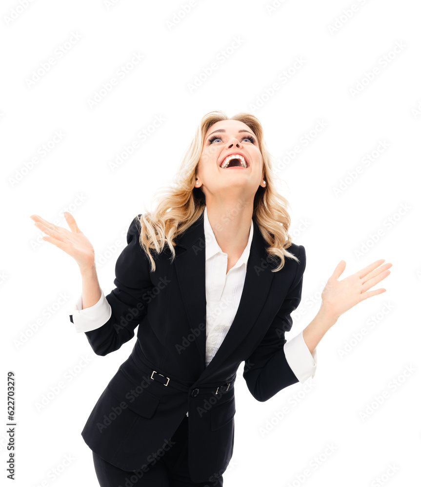 Happy gesturing young cheerful businesswoman in black suit, isolated over white background. Portrait of confident business woman at studio.
