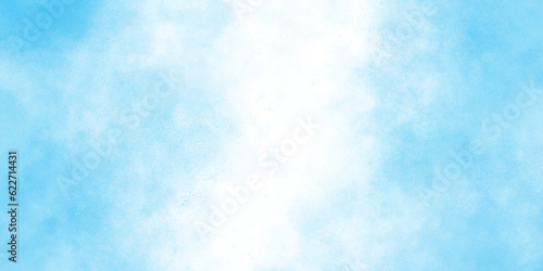 Abstract Watercolor shades blurry and defocused Cloudy Blue Sky Background, blurred and grainy Blue powder explosion on white background, Classic hand painted Blue watercolor background for design. 