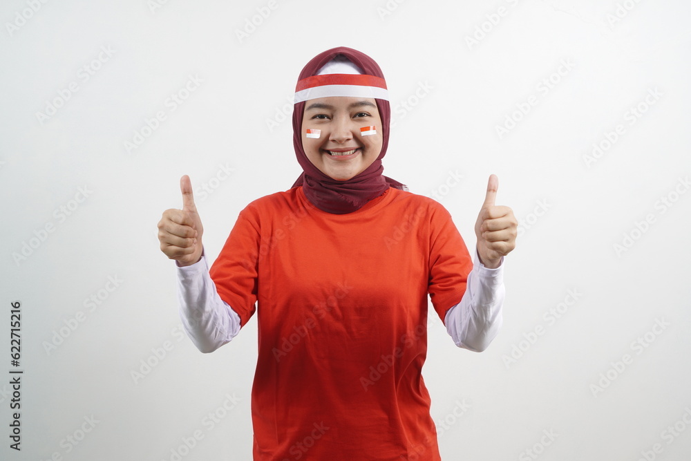 Hijab Woman is celebrating independence day with thumb up Hijab Woman is celebrating independence day with thumb up