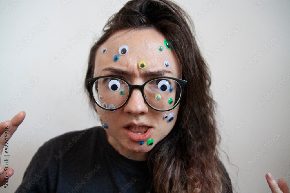 Emotional young lady mental health issues hearing problems poor eyesight portrait closeup eyes problems depressed scared bad vision Emotional young lady mental health issues hearing problems poor eyesight portrait closeup eyes problems depressed scared bad vision