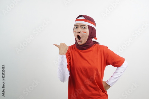 Woman pointing something - indonesian independence day concept