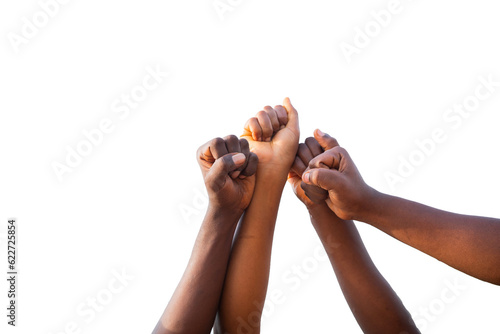 Four fists of African people united in sky, photo with transparent background and copy space.