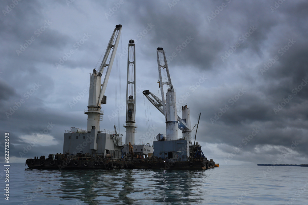 Marine cranes are used for loading and unloading cargo onto ships. Marine cranes are used for loading and unloading cargo onto ships.