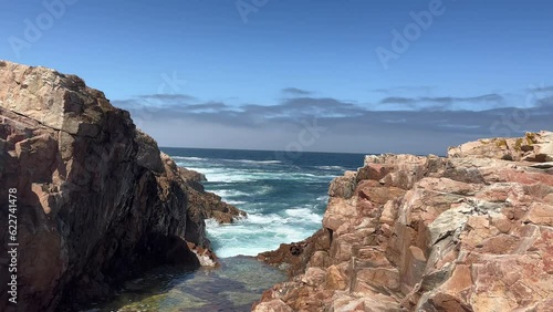 Atlantic ocean view, Relaxing, meditation background. Crashing waves by cliffs. Slow motion