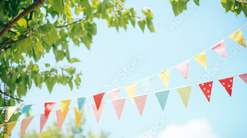 Colorful pennant string decoration in tree