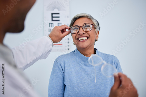 Glasses, doctor or happy old woman in eye test assessment for healthcare, wellness or vision examination. Smile, visual or mature client testing a optician or optometrist in optometry consultation photo