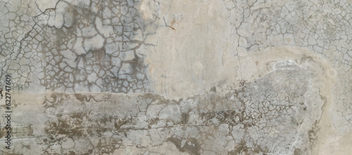 The texture of the old cement wall with silver paint, the background of the old wall of silver cement paint, taken from a close-up angle