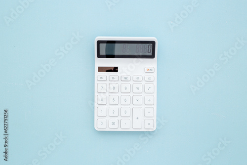 Financial accounting work with calculator. Business report preparing
