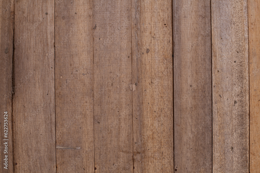 Fototapeta premium Photograph of wood texture in vertical. Concept of backgrounds and textures.