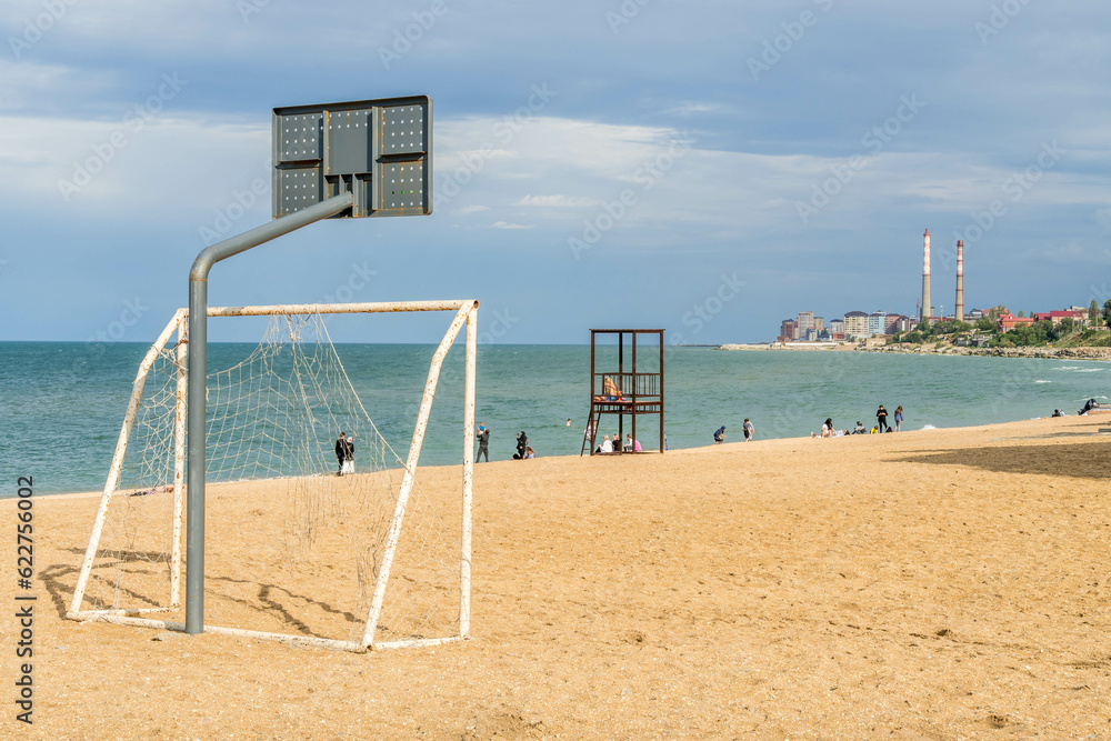 The basketball and football (soccer) sporting facilities, the lifeguard tower on the Caspian Sea beach in Mahachkala, Dagestan Republic in southern Russia The basketball and football (soccer) sporting facilities, the lifeguard tower on the Caspian Sea beach in Mahachkala, Dagestan Republic in southern Russia