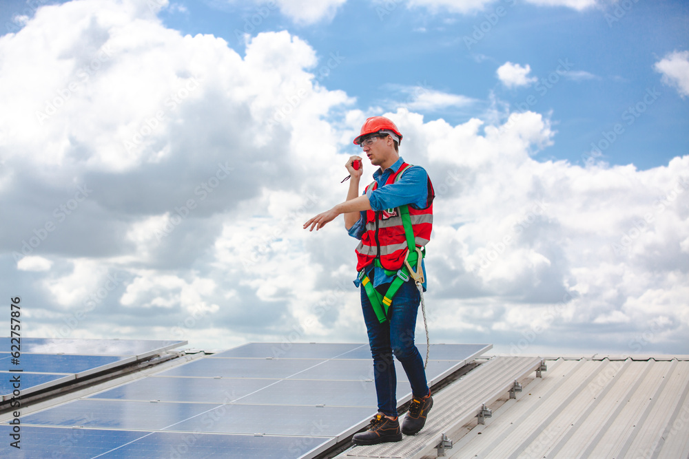Elegant engineer holding a walkie talkies to working in determined and has a vision like a leader, Discussion and coordination between departments about problem solving, blue collar concept Elegant engineer holding a walkie talkies to working in determined and has a vision like a leader, Discussion and coordination between departments about problem solving, blue collar concept