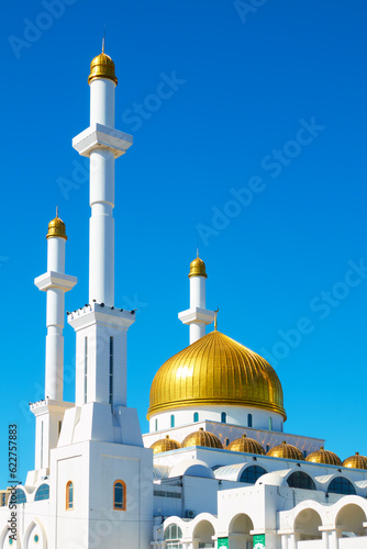 Golden dome and tall minarets of Abu Nasr Al-Farabi mosque