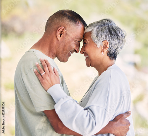 Senior couple, happy together and love in marriage or hug with support in nature, garden or nursing home. Lovers, embrace and elderly people relax with freedom, happiness and smile in retirement