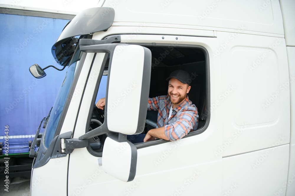driver behind the wheel in truck cabin driver behind the wheel in truck cabin