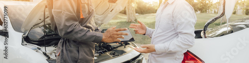 mechanic checking engine security testing tools before customers travel far © Wicitr