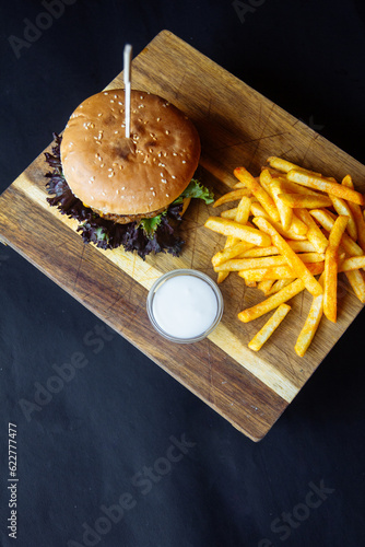delicious juicy burger and fries
