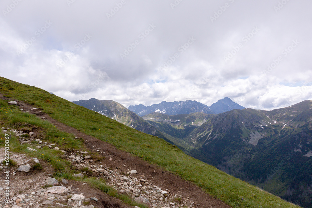 
Natural daytime view of the Polish Tatra Mountains with hiking trails popular with tourists
