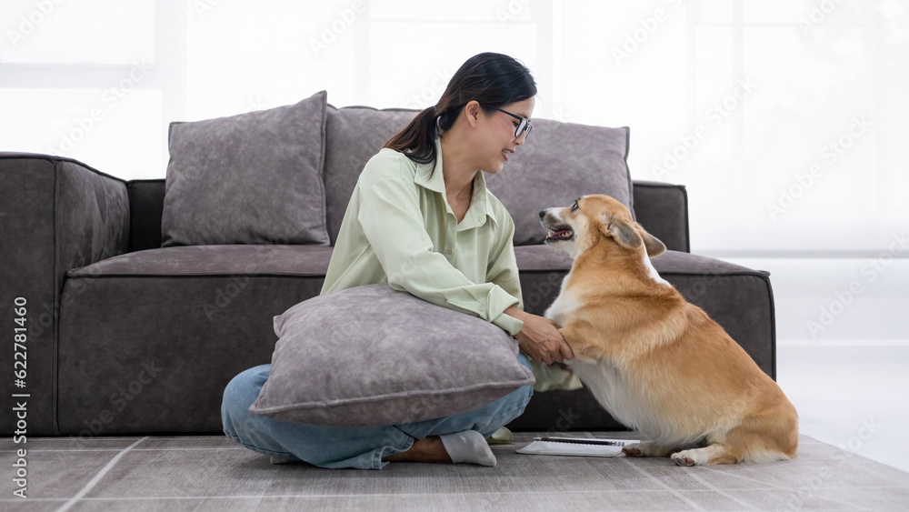 Woman finds joy in productivity and pet companionship.