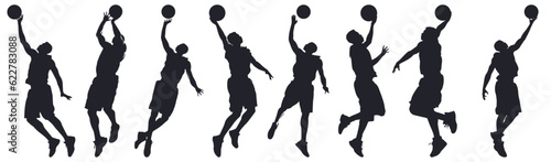 Vector set of 8 silhouettes of basketball players. The player throws the ball while jumping photo