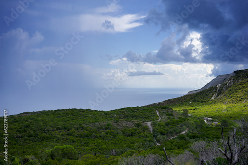 Italy, Aeolian islands, Lipari, view from Cava di Pumice, rain cloud