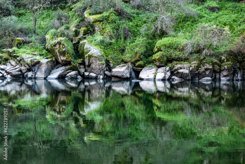 Rocks with river reflections