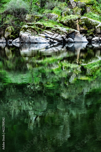 Rocks with river reflections