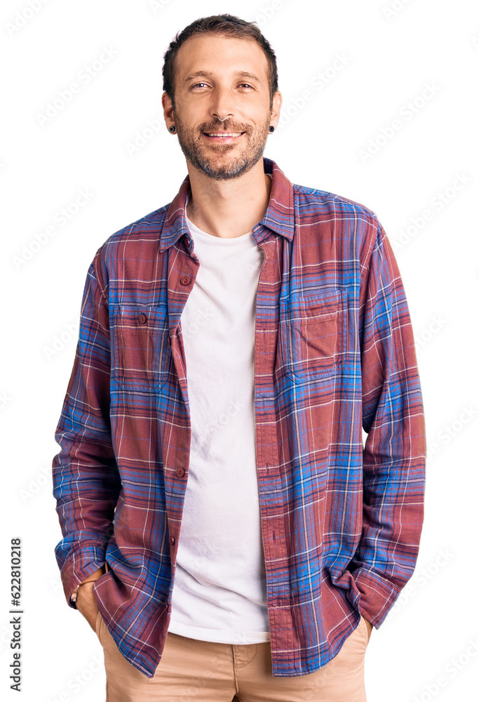 Young handsome man wearing casual clothes with a happy and cool smile on face. lucky person. Young handsome man wearing casual clothes with a happy and cool smile on face. lucky person.