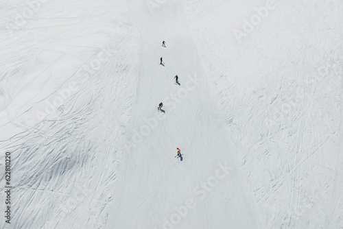 Aerial view of skiers, Mount Etna, Sicily, Italy.