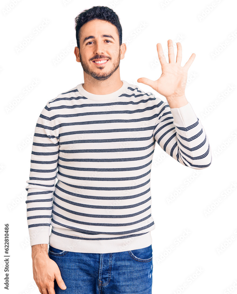 Young hispanic man wearing casual clothes showing and pointing up with fingers number five while smiling confident and happy. Young hispanic man wearing casual clothes showing and pointing up with fingers number five while smiling confident and happy.