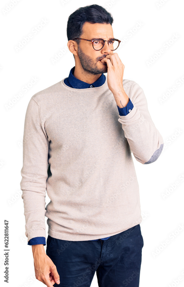 Young handsome hispanic man wearing elegant clothes and glasses looking stressed and nervous with hands on mouth biting nails. anxiety problem. Young handsome hispanic man wearing elegant clothes and glasses looking stressed and nervous with hands on mouth biting nails. anxiety problem.