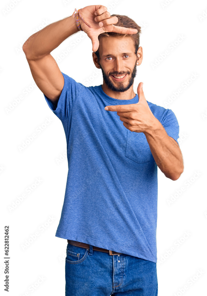 Handsome blond man with beard wearing casual clothes smiling making frame with hands and fingers with happy face. creativity and photography concept. Handsome blond man with beard wearing casual clothes smiling making frame with hands and fingers with happy face. creativity and photography concept.