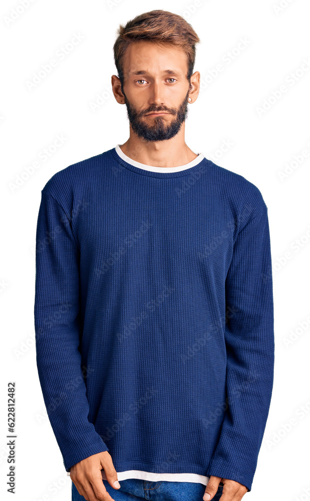 Handsome blond man with beard wearing casual sweater depressed and worry for distress, crying angry and afraid. sad expression. Handsome blond man with beard wearing casual sweater depressed and worry for distress, crying angry and afraid. sad expression.