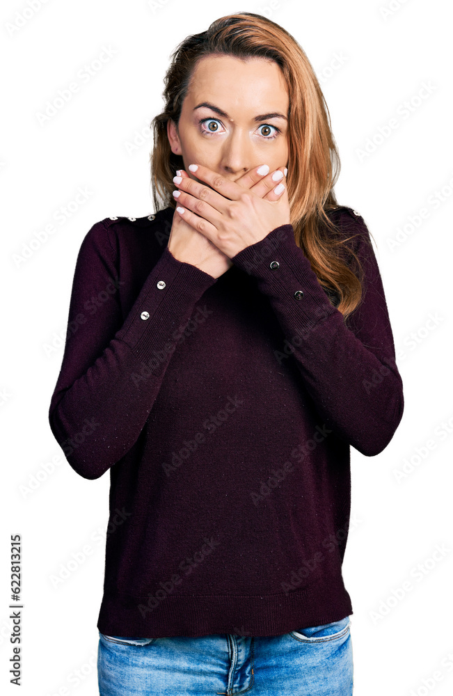 Young caucasian woman wearing casual clothes shocked covering mouth with hands for mistake. secret concept. Young caucasian woman wearing casual clothes shocked covering mouth with hands for mistake. secret concept.
