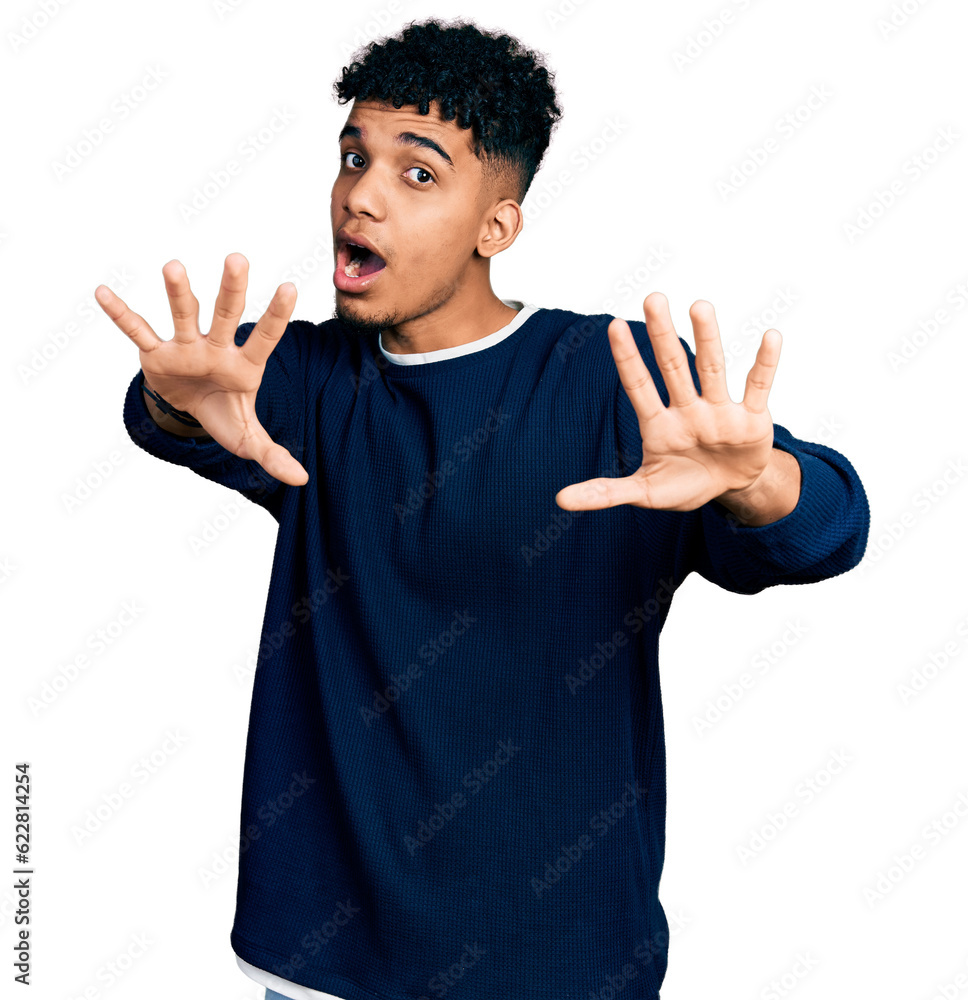 Young african american man wearing casual clothes doing stop gesture with hands palms, angry and frustration expression Young african american man wearing casual clothes doing stop gesture with hands palms, angry and frustration expression
