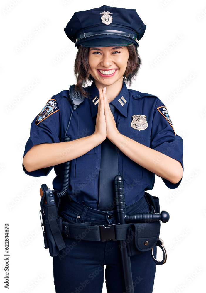 Young beautiful girl wearing police uniform praying with hands together asking for forgiveness smiling confident. Young beautiful girl wearing police uniform praying with hands together asking for forgiveness smiling confident.
