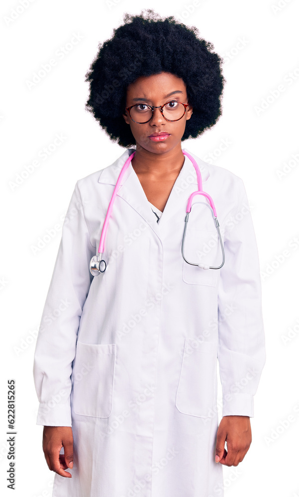Young african american woman wearing doctor coat and stethoscope skeptic and nervous, frowning upset because of problem. negative person. Young african american woman wearing doctor coat and stethoscope skeptic and nervous, frowning upset because of problem. negative person.