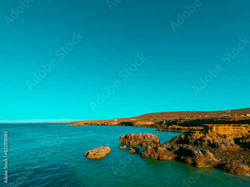 Coastal landscape with cliffs and rocks