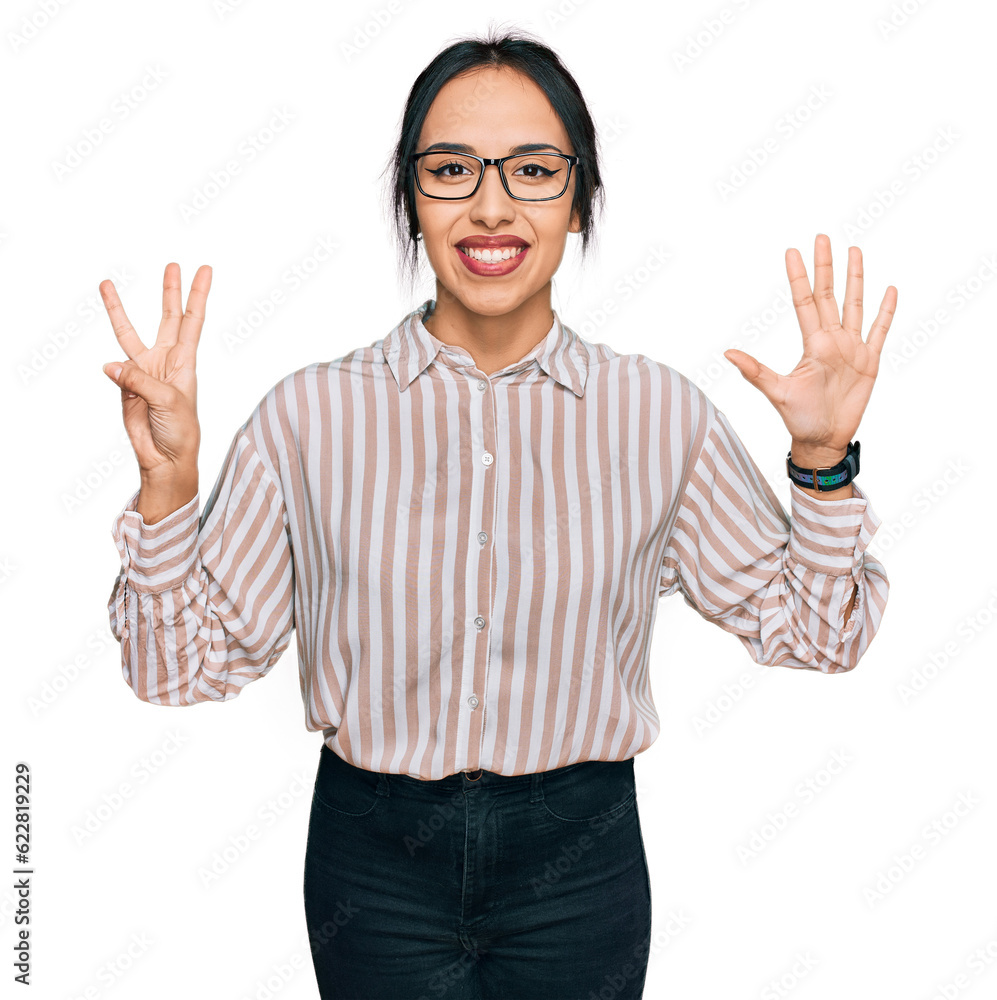 Young hispanic girl wearing casual clothes and glasses showing and pointing up with fingers number eight while smiling confident and happy. Young hispanic girl wearing casual clothes and glasses showing and pointing up with fingers number eight while smiling confident and happy.