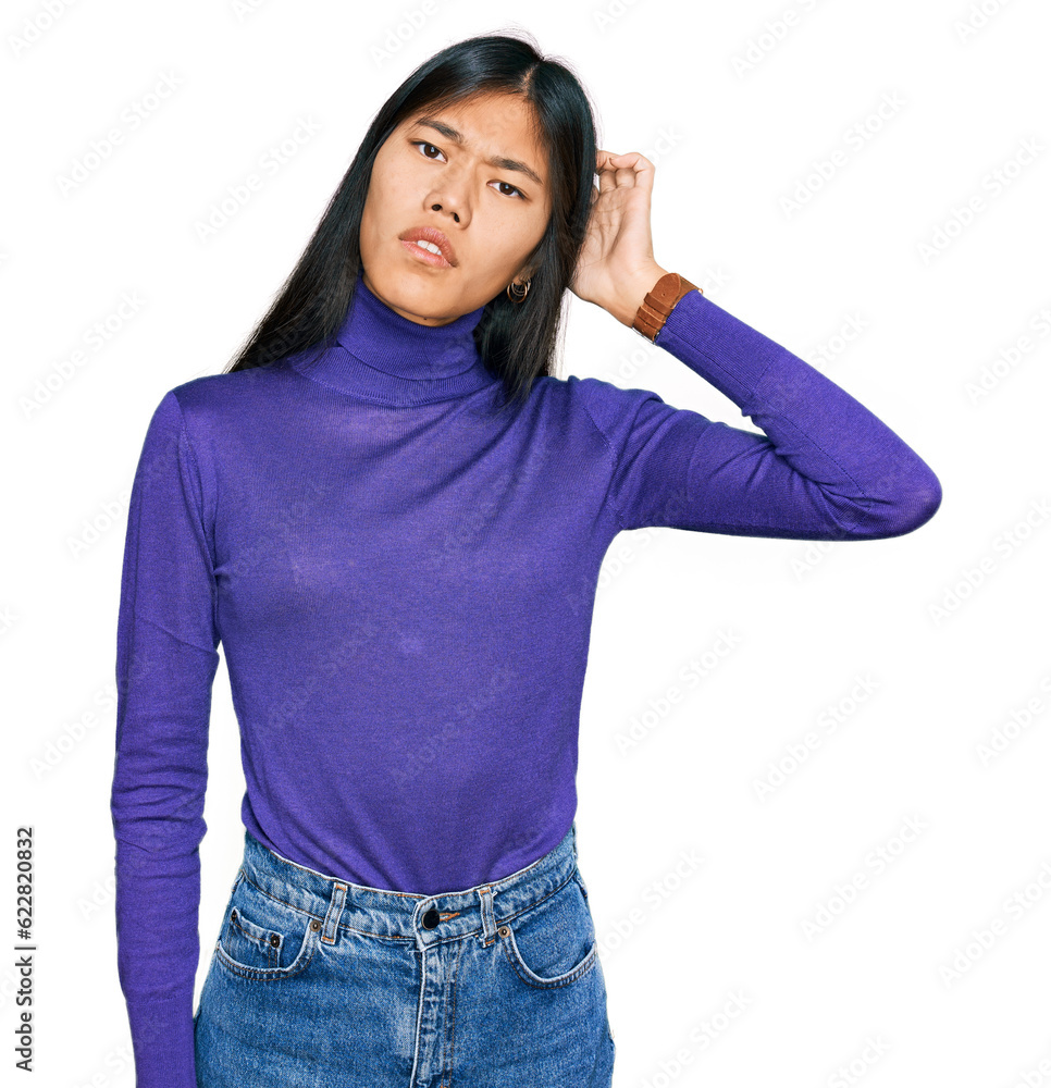 Beautiful young asian woman wearing casual clothes confuse and wondering about question. uncertain with doubt, thinking with hand on head. pensive concept. Beautiful young asian woman wearing casual clothes confuse and wondering about question. uncertain with doubt, thinking with hand on head. pensive concept.