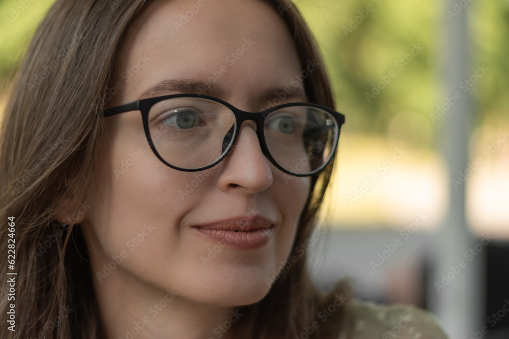 Portrait of thoughtful woman with glasses with designer frame, with prescription len. Eye care, vision problems concept. Portrait of thoughtful woman with glasses with designer frame, with prescription len. Eye care, vision problems concept.