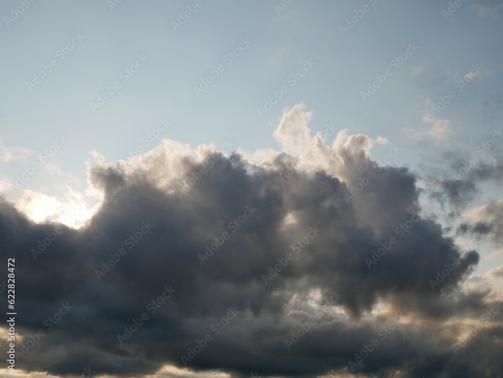 Stormy sky with white and grey clouds background, beautiful sunset heaven photo