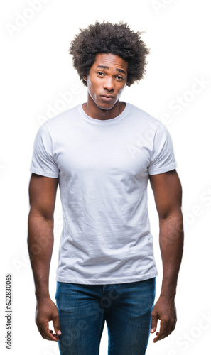 Afro american man over isolated background skeptic and nervous, frowning upset because of problem. Negative person.