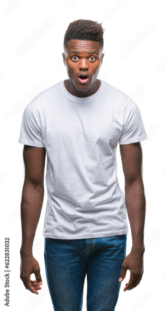 Young african american man over isolated background afraid and shocked with surprise expression, fear and excited face. Young african american man over isolated background afraid and shocked with surprise expression, fear and excited face.