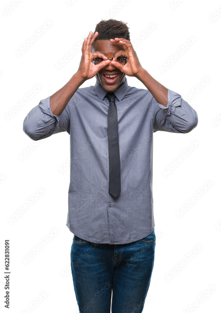 Young african american business man over isolated background doing ok gesture like binoculars sticking tongue out, eyes looking through fingers. Crazy expression. Young african american business man over isolated background doing ok gesture like binoculars sticking tongue out, eyes looking through fingers. Crazy expression.