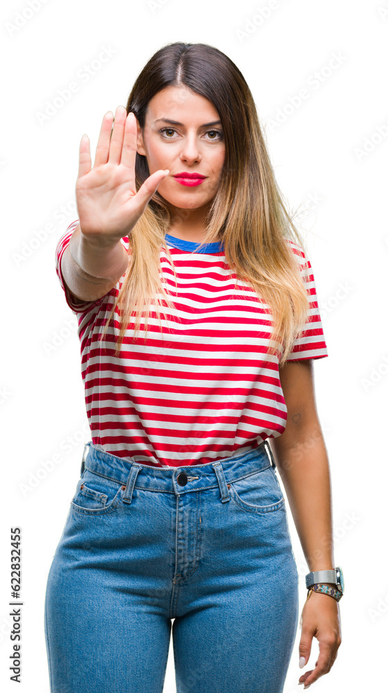 Young beautiful woman casual look over isolated background doing stop sing with palm of the hand. Warning expression with negative and serious gesture on the face. Young beautiful woman casual look over isolated background doing stop sing with palm of the hand. Warning expression with negative and serious gesture on the face.