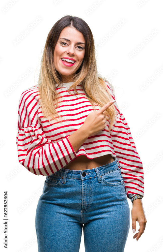 Young beautiful woman casual stripes winter sweater over isolated background cheerful with a smile of face pointing with hand and finger up to the side with happy and natural expression on face Young beautiful woman casual stripes winter sweater over isolated background cheerful with a smile of face pointing with hand and finger up to the side with happy and natural expression on face
